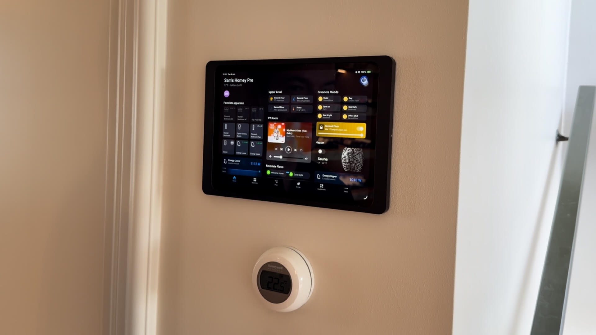 Wall-mounted iPad showing a Huum sauna widget